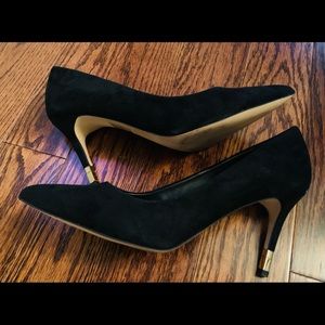 Black Aldo suede heels.